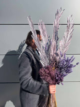 SHAVIDA » bouquet dalle tonalità del lilla e foglie di palma metallizzate